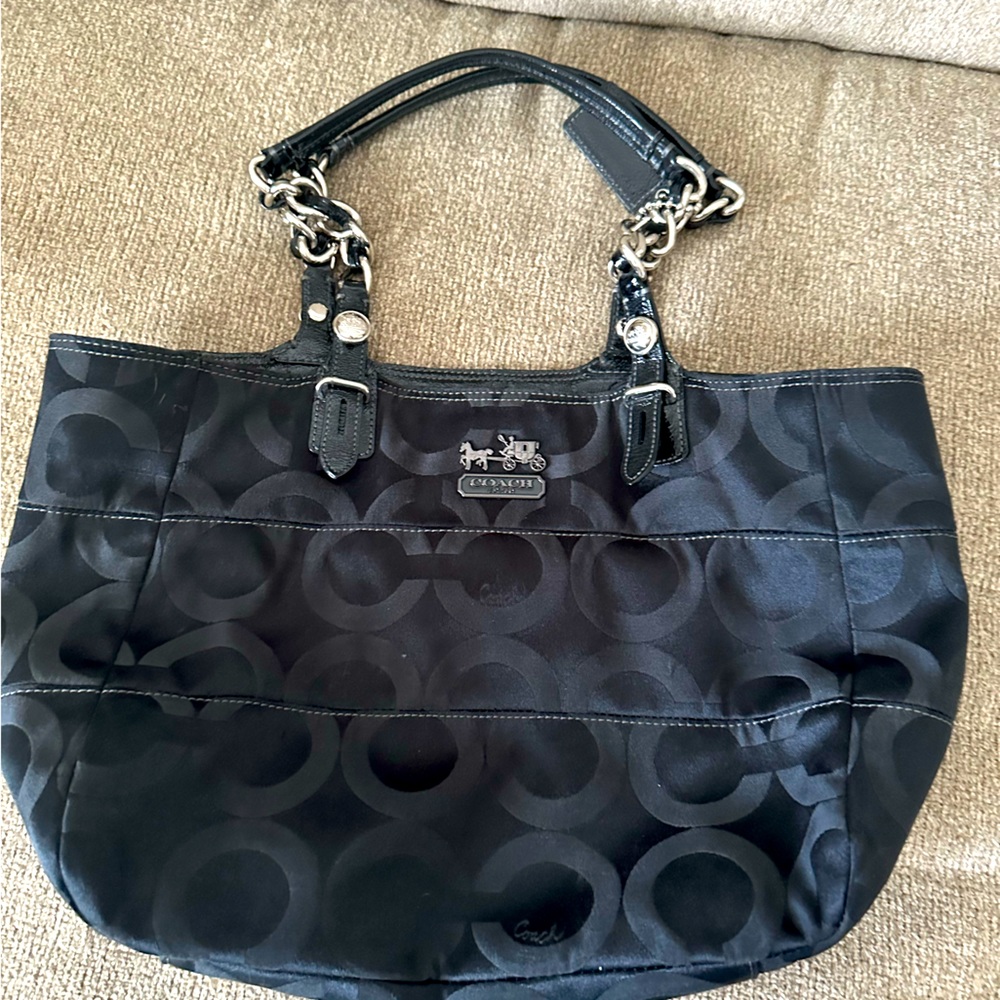 Black coach bag with lots of pockets